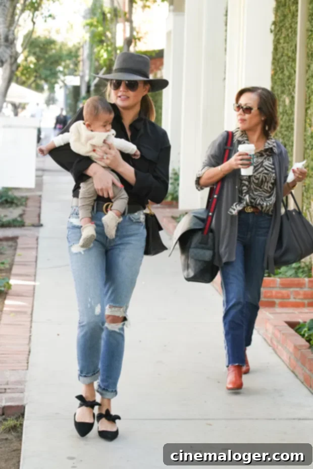 Chrissy Teigen and her mom, Pepper Thai, sharing a moment together.